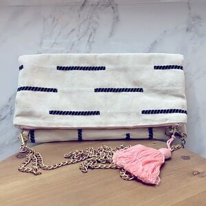 Tribe Alive fabric clutch with chain strap and tassel